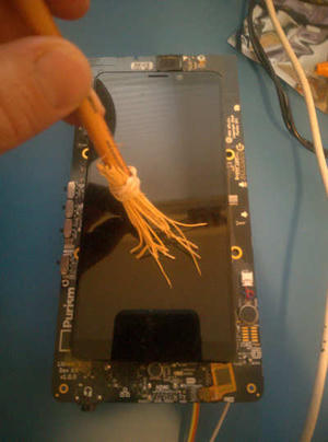 sweeping off the devkit for recommissioning with a tiny broom